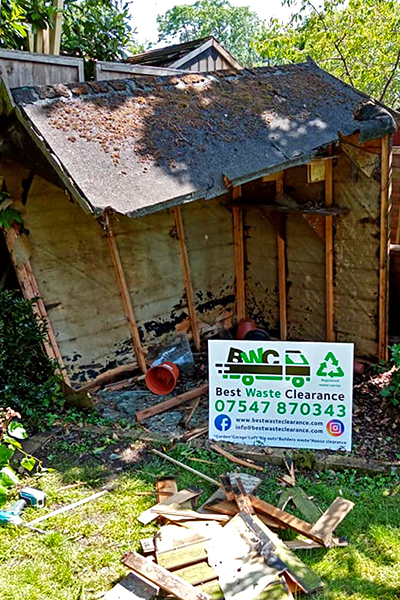 Removing a shed from a customers garden.